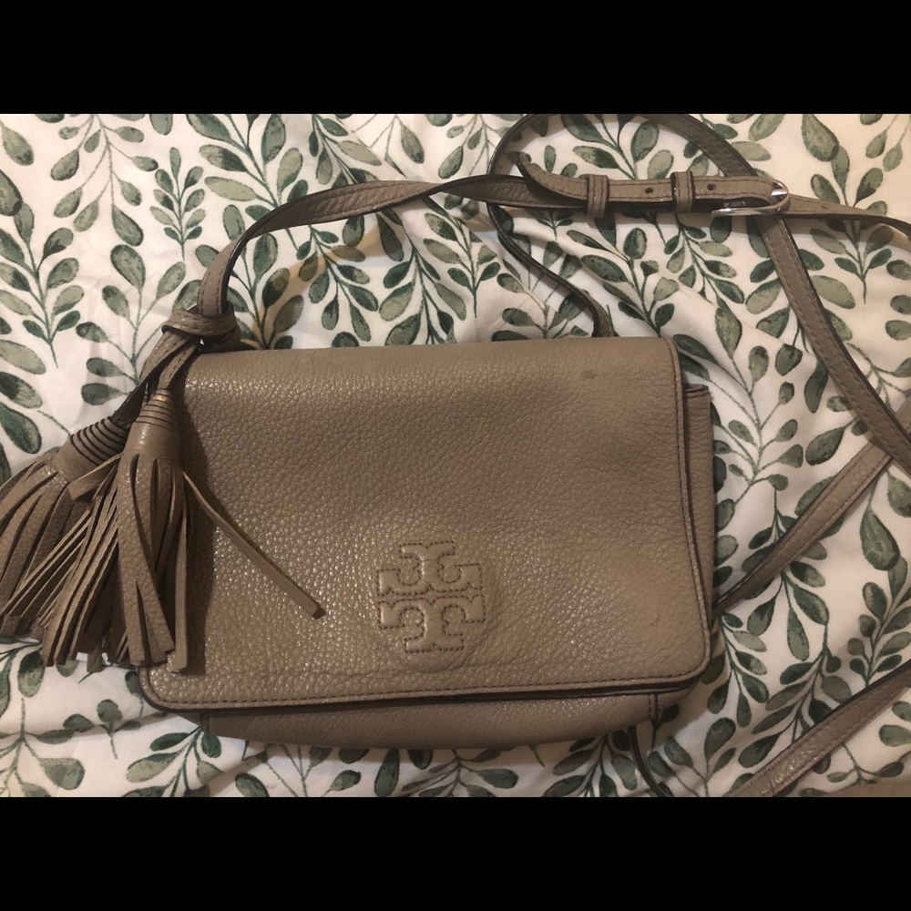 Tory Burch over the shoulder bag.